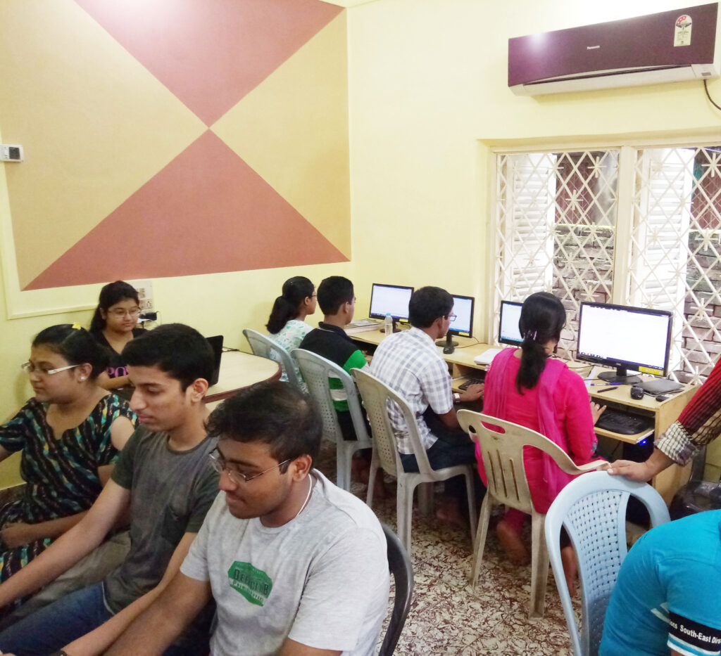 Students learning practical computer skills in Kolkata